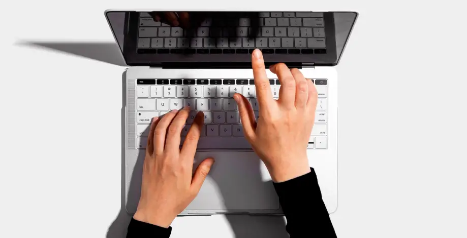 Laptop and hands