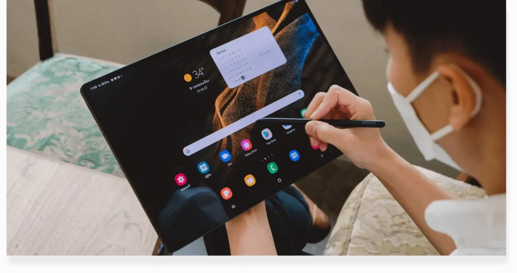 A user interacting with a translation app on an Android tablet, optimizing productivity through advanced digital tools.