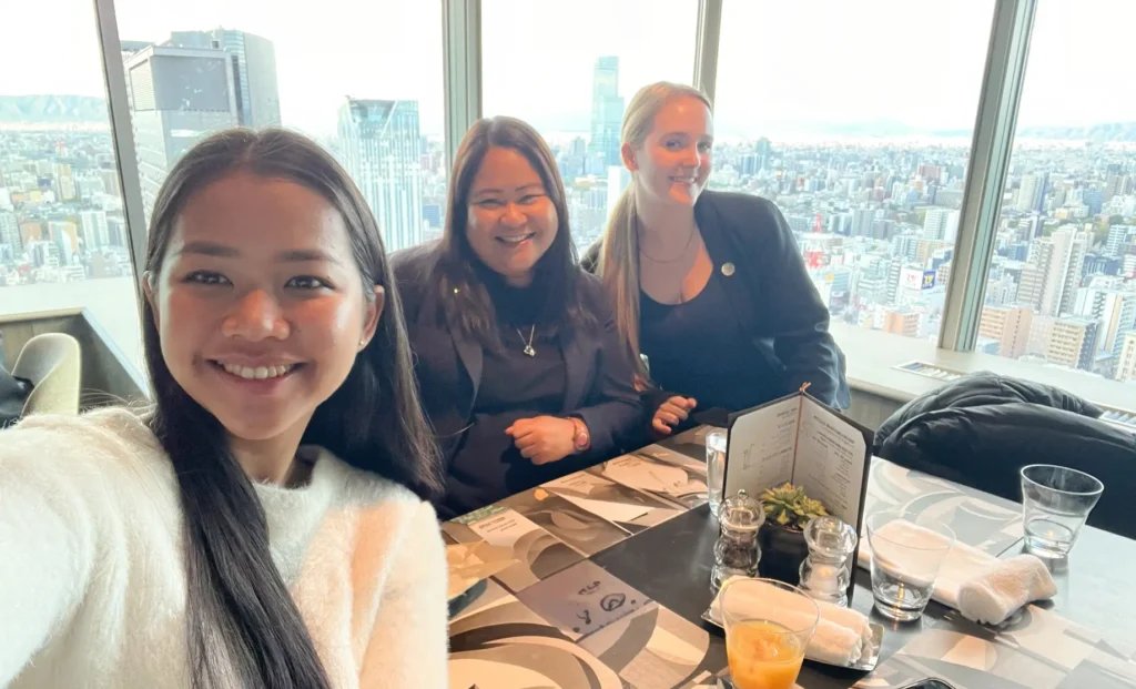 One of Lexcode’s translation project managers poses with a client and hotel staff at of Swissôtel Nankai Osaka.